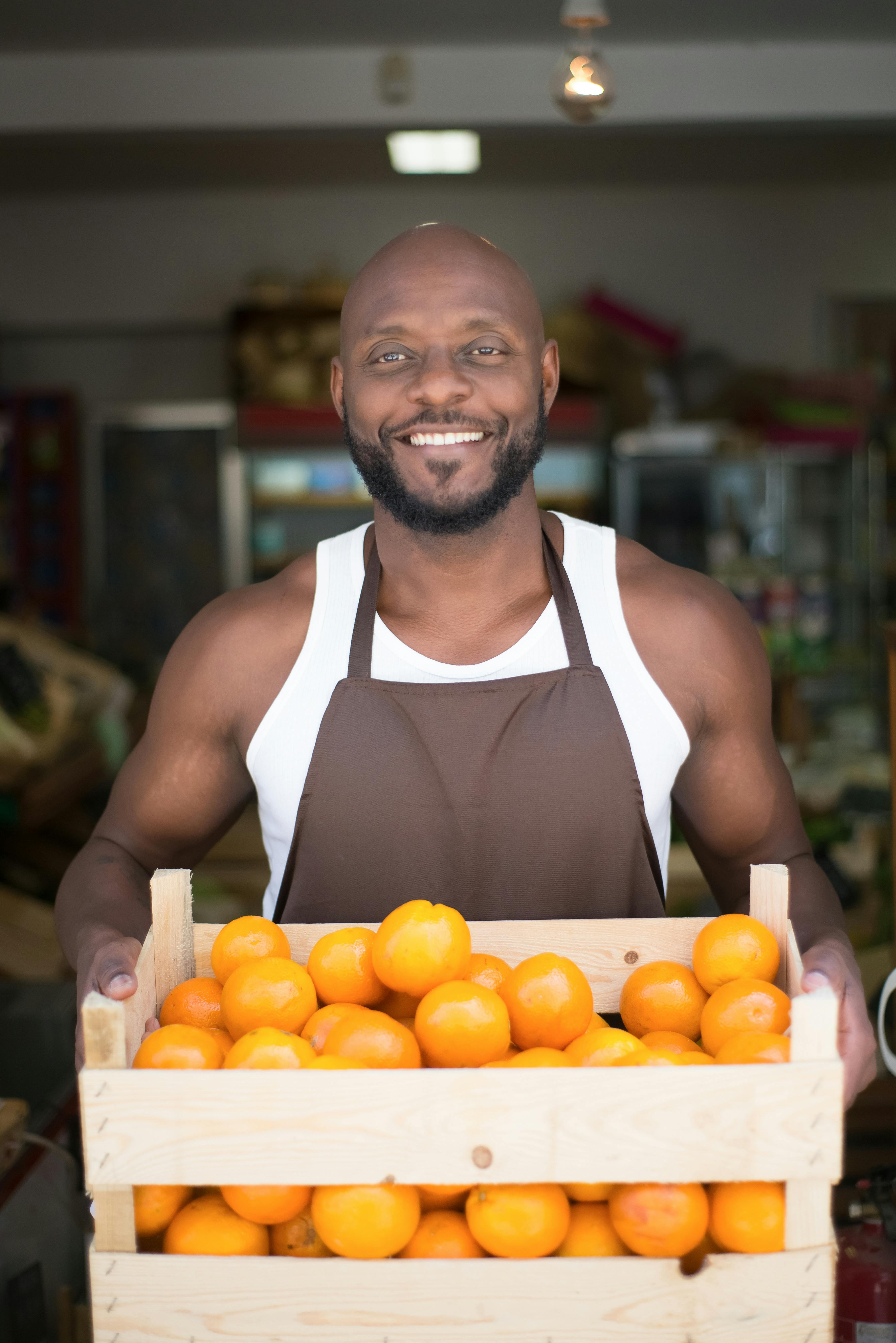 A farmer with a basket of Oranges, Meeticks